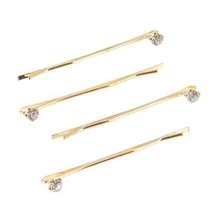 Barrettes dorées 1 strass X 4,  Barrettes dorées 1 strass X 4