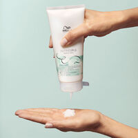 Conditionneur d&eacute;m&ecirc;lant pour cheveux ondul&eacute;s et boucl&eacute;s Nutricurls