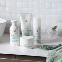Conditionneur d&eacute;m&ecirc;lant pour cheveux ondul&eacute;s et boucl&eacute;s Nutricurls